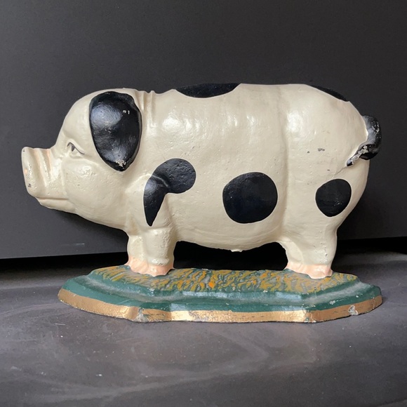Cast iron pig door stop